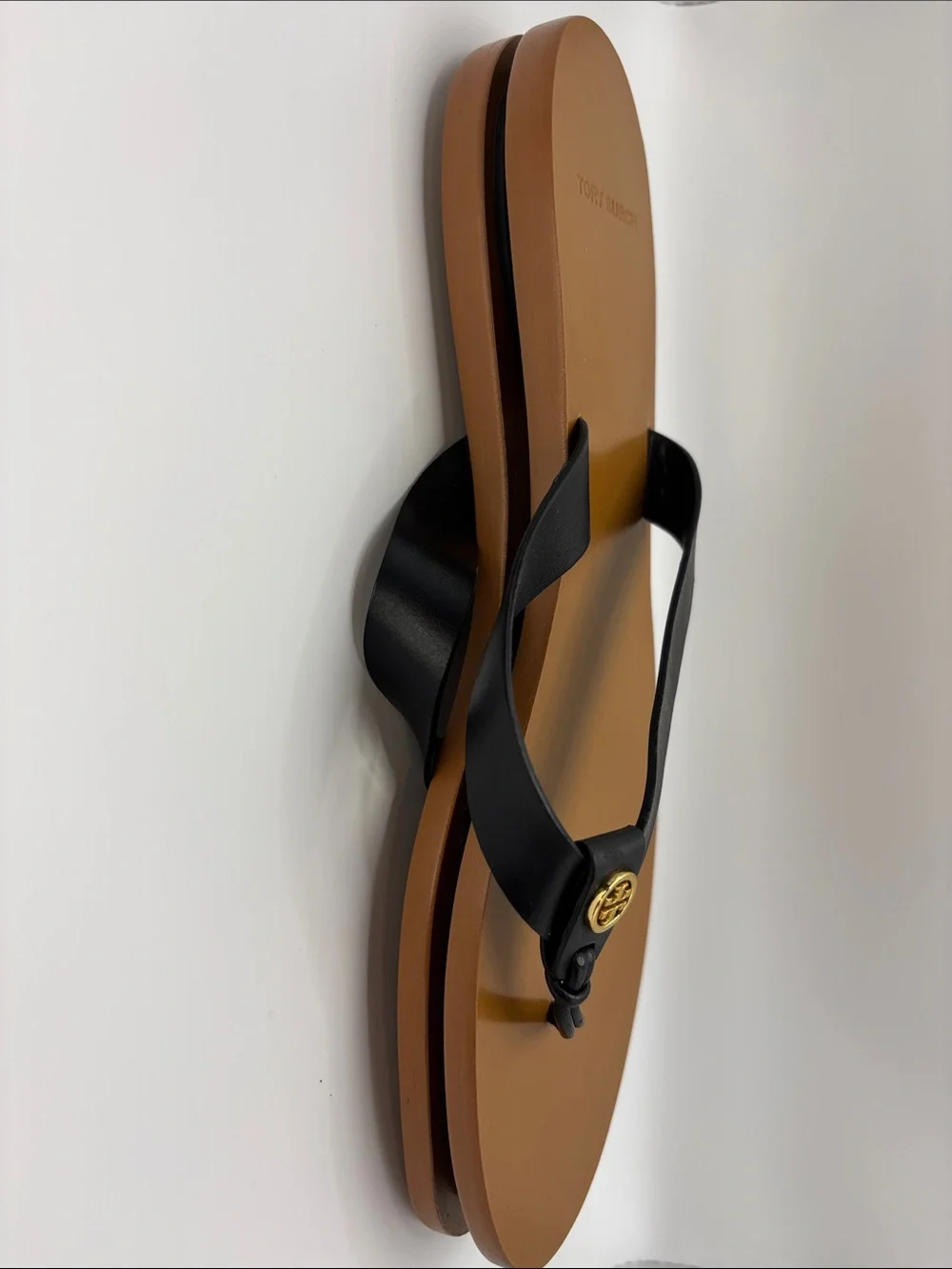 Tory Burch Black and Tan Leather Flip Flop Sandals